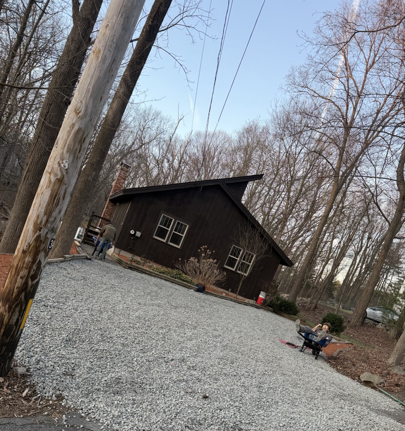 New gravel driveway installed by TB Lawn and Landscape with professional grading and edging